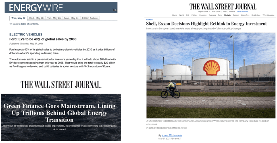 A man riding his bike past an oil refinery.